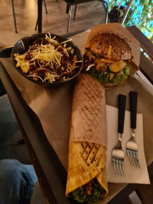 Poutine, wrap and burger gyros at Farma Burgerownia Roslinna in Krakow