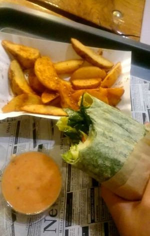 spinach tortilla and wedges at Farma Burgerownia Roslinna in Krakow