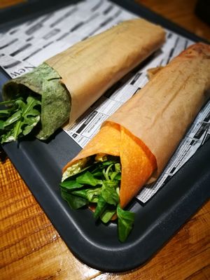 two tortia: one's a spinach tortia with fried tofu; the other's with seitan shewarma  at Farma Burgerownia Roslinna in Krakow