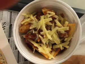 cheesy chips at Farma Burgerownia Roslinna in Krakow