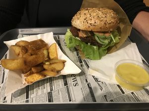 Ranczer Burger; Potato wedges and farm‘s sauce  at Farma Burgerownia Roslinna in Krakow