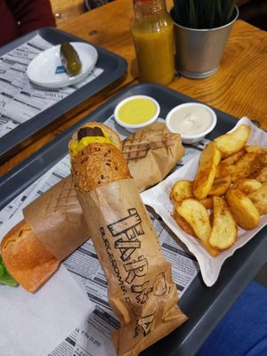 Curry sausage and wedges at Farma Burgerownia Roslinna in Krakow