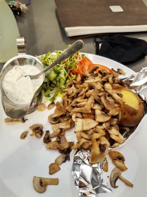 Oven potato with champignon and am hereby cream cheese at Cafe Flora in Bad Harzburg