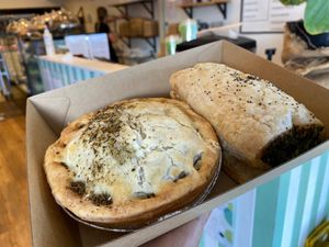 Pies & cheesey spinach rolls  at Veganyumm Bakehouse in Brisbane