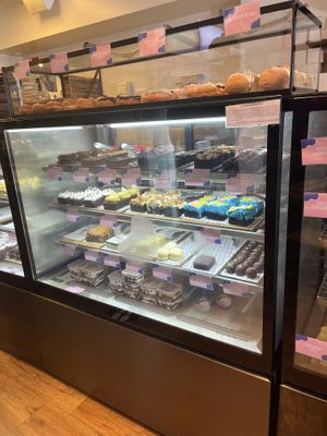 Sweets shelf and donuts up top   at Veganyumm Bakehouse in Brisbane