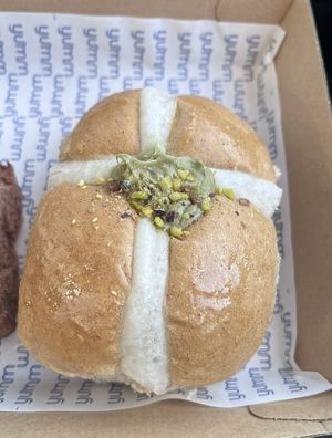 Pistachio hot cross bun  at Veganyumm Bakehouse in Brisbane