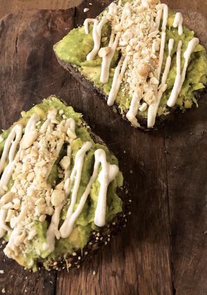 Avocado toast with tahini and almonds  at Pum Pum Cafe in Madrid