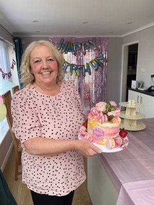 60th birthday cake with fresh fruit and flowers at Jesmond Cake Company in Newcastle Upon Tyne