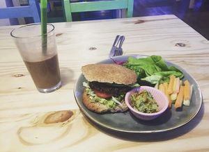 Veggie burger and chocolate shake. at Cafe Vida in La Paz