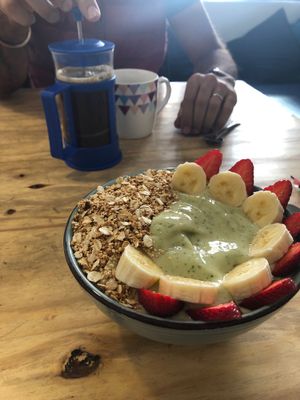 Green smoothie bowl and fresh coffee at Cafe Vida in La Paz