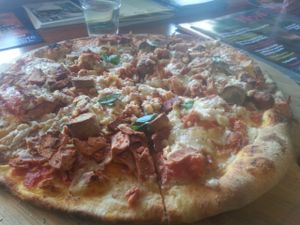 Vegan meat lovers pizza with ham, sausage and chorizo at CassellBella's Bakery Cafe in Northcote