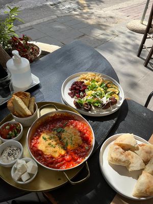 Vegan omelette in tomato slices and Israeli plate at ONO by Marouli in Rhodes