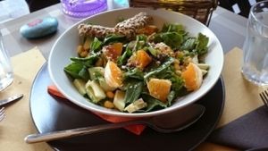 delicious salad with lettuce, corn,oranges, arugula, avocado, sesame and sunflower seeds  at ONO by Marouli in Rhodes