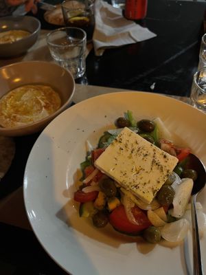 hummus to the right and vegan greek salad  at ONO by Marouli in Rhodes