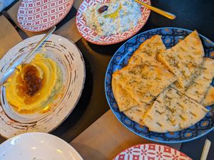 Pitta bread, fava with caramelised onion, tzatziki at ONO by Marouli in Rhodes
