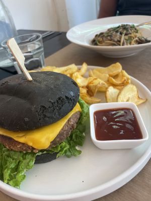 California burger with mango mayo, mushroom tagliatelle (made vegan) delicious 🤤   at ONO by Marouli in Rhodes