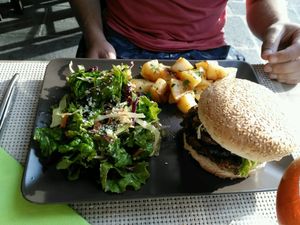 Homemade burger, salad and potatoes. at ONO by Marouli in Rhodes