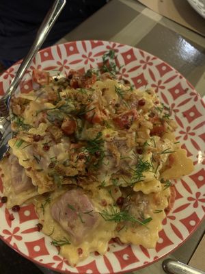 Ravioli with capers, dill, pink peppercorn and cherry tomatoes  at ONO by Marouli in Rhodes
