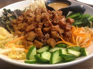 The bibimbap was divine!! The plate consisted of kimchi, seaweed, tempeh, rice and raw fresh veggies with a serving of their "spicy" (not really, but still super tasty) sunflower seed sauce! at Plants in Taipei