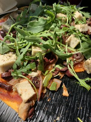 Greek pizza with feta and olives at Veganaki in Athens