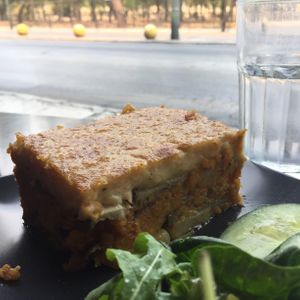 Moussaka (August 2021)
‘Bechamel’ sauce made with almond milk and cauliflower. A layer of eggplant. Lentil filling in real tomato sauce with onions. Bottom made from potato sl at Veganaki in Athens