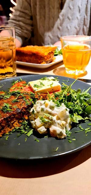 Moussaka and mushroom omelette at Veganaki in Athens