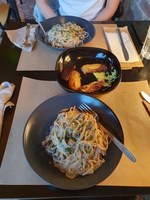 Spaghetti Carbonara. The air-fried potatoes were a bit too thick. at Veganaki in Athens