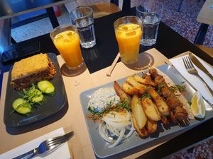 Pastitsio on the left and the souvlaki plate on the right at Veganaki in Athens