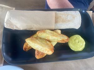 Meatballs in tomato sauce in a wrap, little spicy, and delicious American style mayonnaise   at Veganaki in Athens