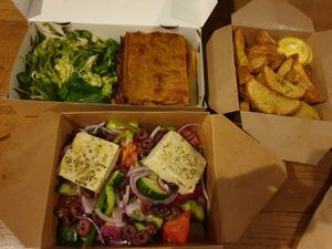 Pastitsio €11.00, Airfried potatoes €5.80, Greek salad €8.50 at Veganaki in Athens