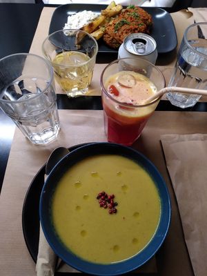 Pomegranate-orange juice, lentil soup, soutzoukakia at Veganaki in Athens