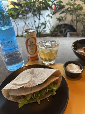 Avocado wrap and kombucha ginger lemon  at Veganaki in Athens