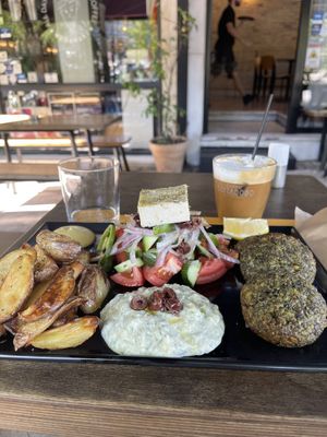 Assiette veganaki et cappuccino froid au lait d amande 💚🌱💚🌱  at Veganaki in Athens