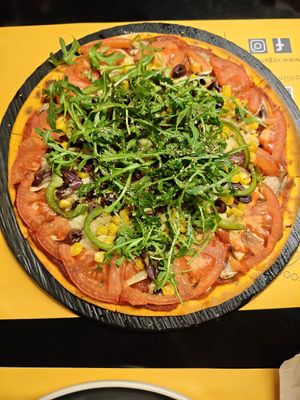 Greek pizza at Veganaki in Athens