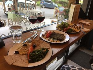 Hummus & tabbouleh, spinach pie, falafel plate at Veganaki in Athens