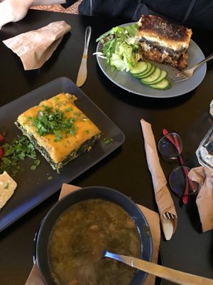Spinach pie with a slice of delicious vegan cheese and the soup of the day (also spinach). at Veganaki in Athens