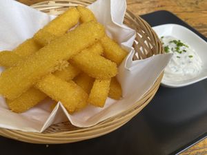 Polenta fries with their really yummy garlic dip! So good   at La Stella Nera in Berlin