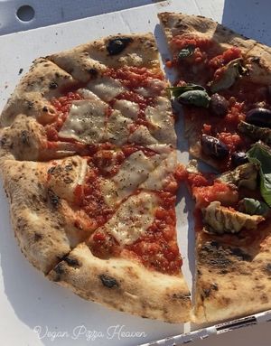 Vegan Margerita + another pizza  at La Stella Nera in Berlin