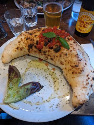 Massive, too spicy vegan calzone at La Stella Nera in Berlin