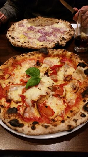Stella Nera and vegan cheese in front, patata e cipolle in back at La Stella Nera in Berlin