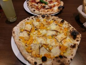 pizza with pumpkin, vegan cheese and rosemary at La Stella Nera in Berlin