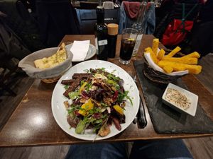 Salad with the polenta fries, yummy! at La Stella Nera in Berlin