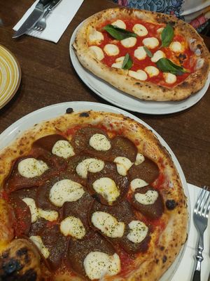 Pizza Magerita, Pizza Diavola at La Stella Nera in Berlin