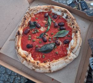 Pizza capperi e olive at La Stella Nera in Berlin