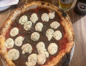 Diavola (tomato sauce, housemade spicy seitan sausage, housemade vegan cheese, oregano) at La Stella Nera in Berlin