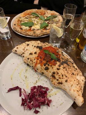 Pizza and calzone  at La Stella Nera in Berlin