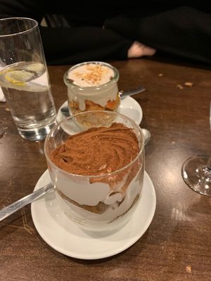 Tiramisu and apple desserts at La Stella Nera in Berlin