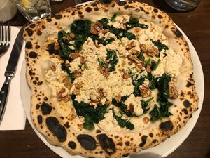Pizza Spinaci Bianca. A bit more flavor would’ve been nice. Maybe some herbs and seasoning. at La Stella Nera in Berlin