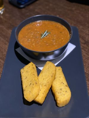 Fried polenta sticks with lentil stew at La Stella Nera in Berlin