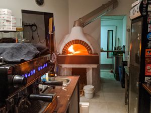 Oven and espresso maker at La Stella Nera at La Stella Nera in Berlin